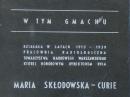 powiększ