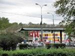 powiększ