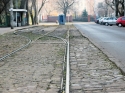 powiększ