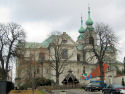 powiększ